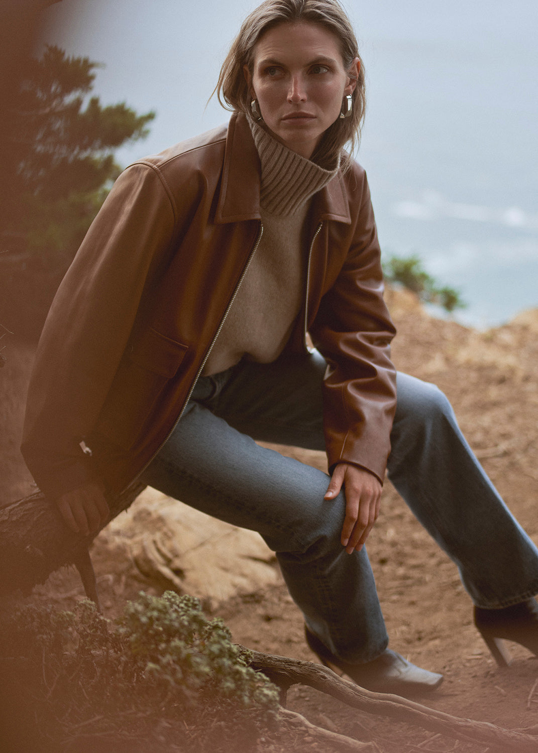 FAYE LONG JEAN IN AZURE BLUE AND ZIP_FRONT BOMBER JACKET IN PRALINE AND SCOUT TURTLENECK SWEATER IN FAWN