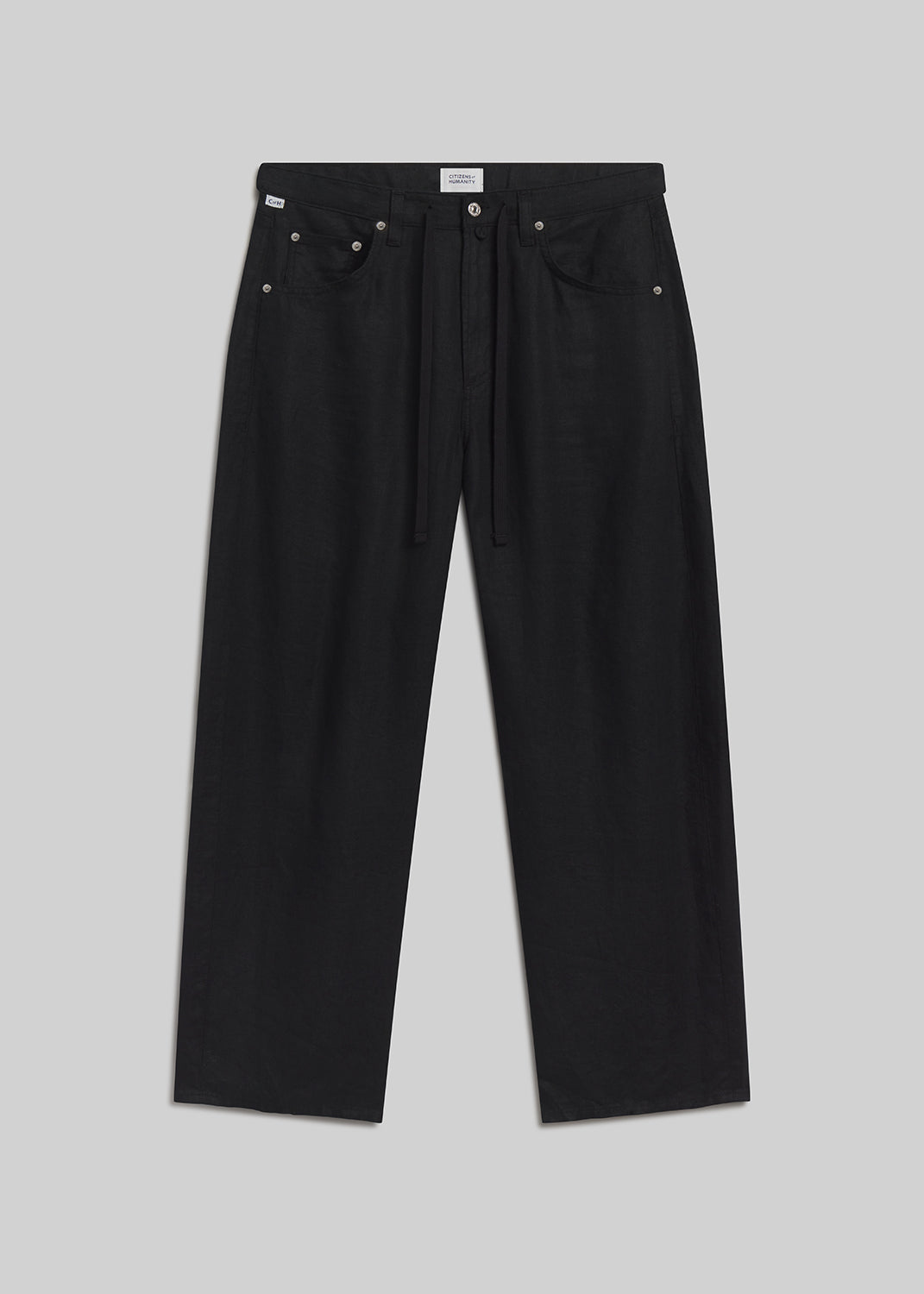 Black drawstring wide-leg pants on grey background