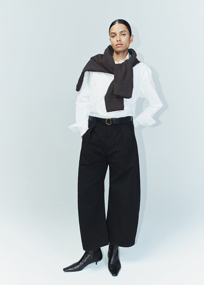 Cara Cropped Pleated Trouser in Black styled on model