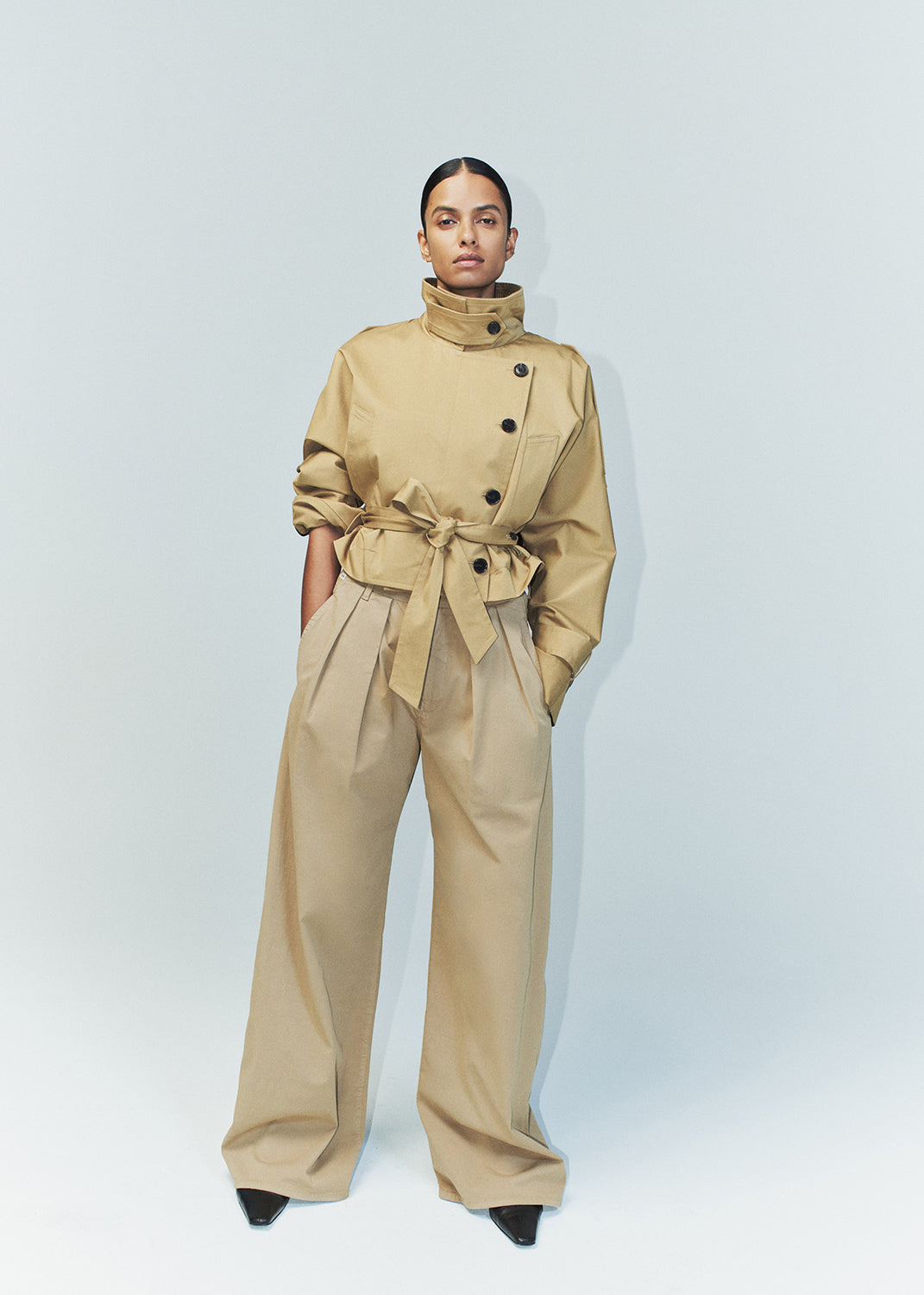 Petra Pleated Trouser in Nano styled on model