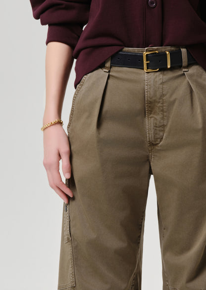Women wearing mahogany cardigan with army green cargo pants