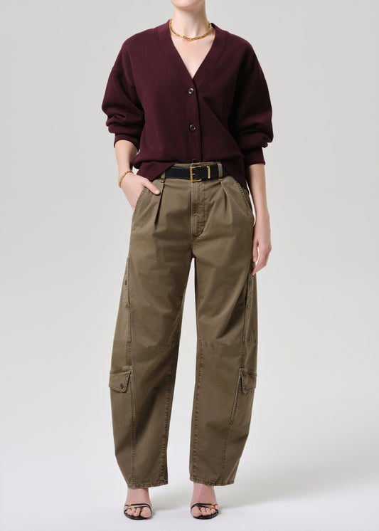Women wearing mahogany cardigan with army green cargo pants