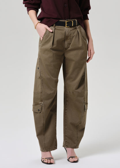 Women wearing mahogany cardigan with army green cargo pants