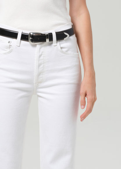 Person wearing a black belt with a white background