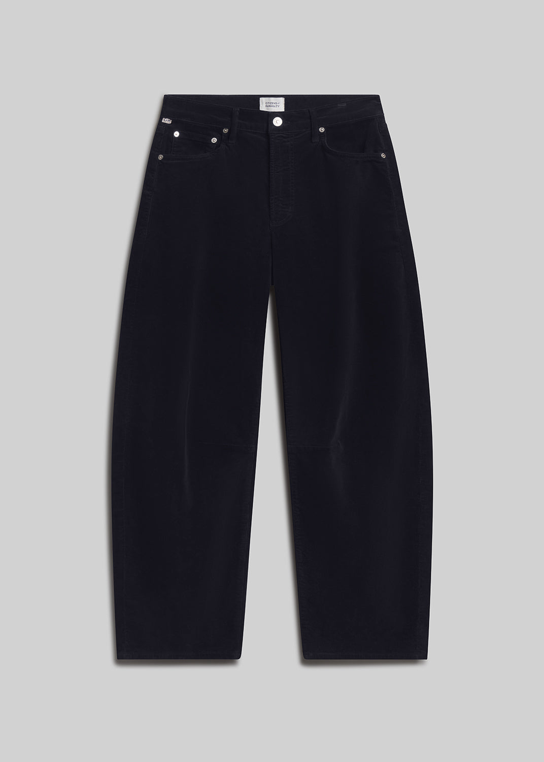 Navy corduroy barrel-leg jeans on grey background