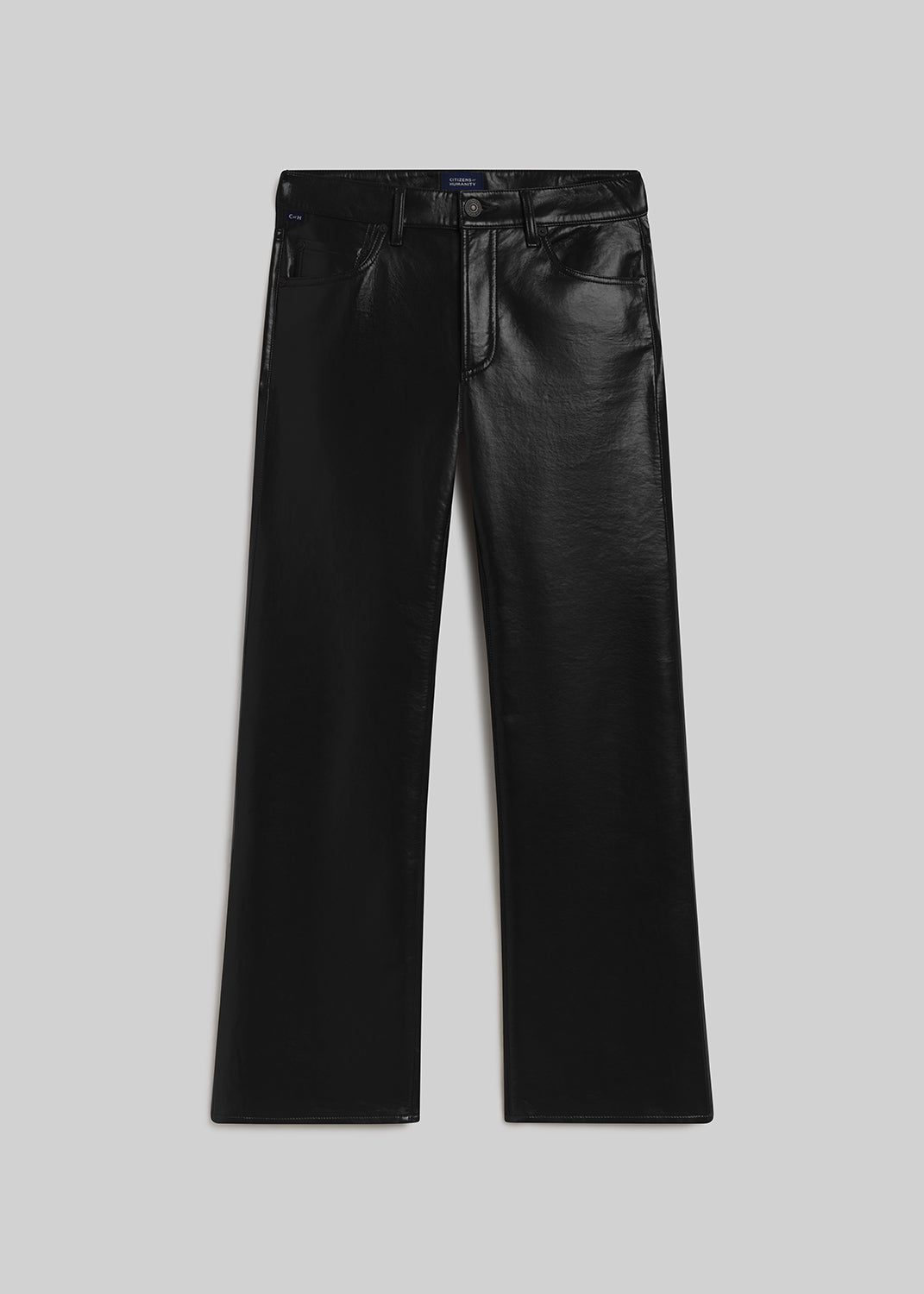Black leather bootcut pants on grey background