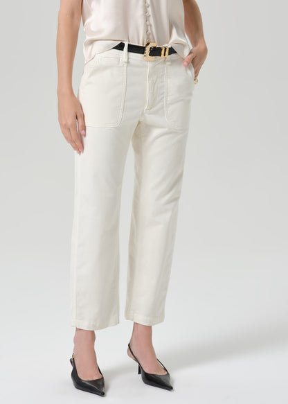 Close up of white pant on a grey background