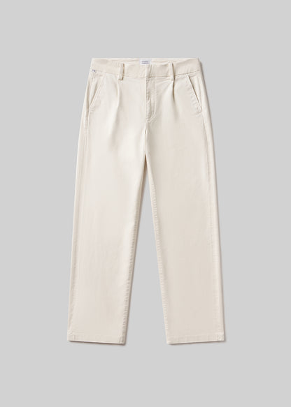 Beige pants on a gray background