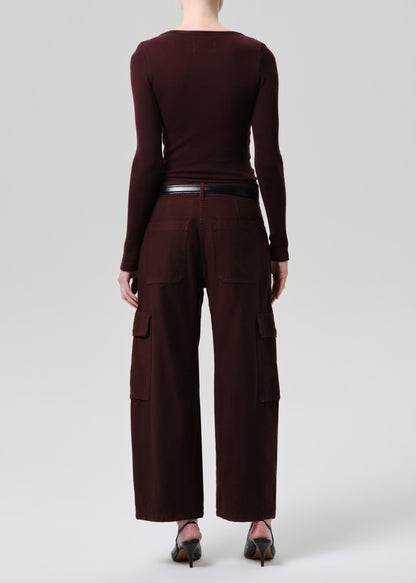 Brown long-sleeve top and wide-leg pants on a grey background