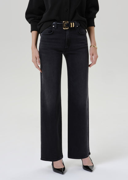 Close up shot of black pants on a grey background