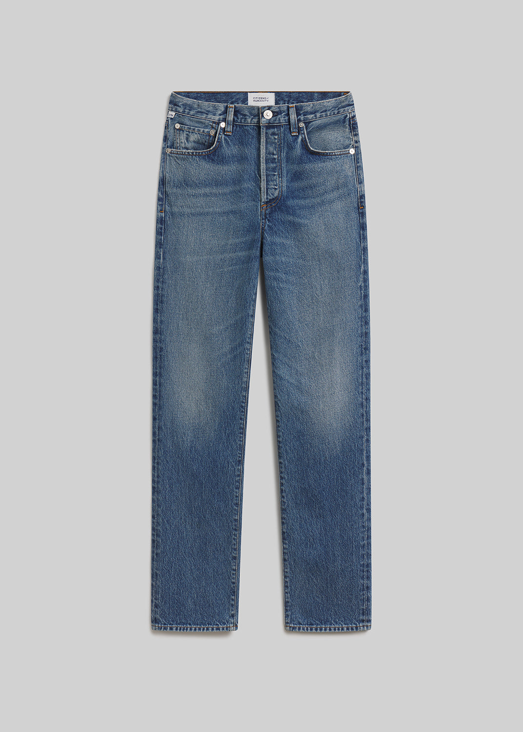 Chaya blue straight-leg jeans on grey background