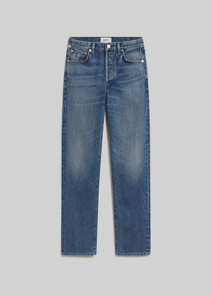 Chaya blue straight-leg jeans on grey background