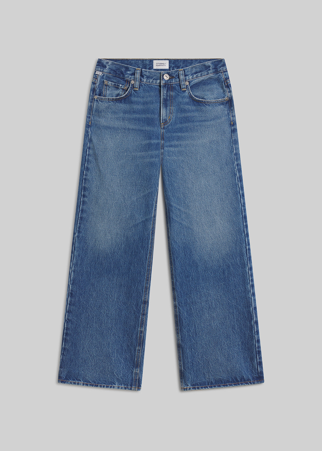 Pastis blue wide-leg jeans on grey background
