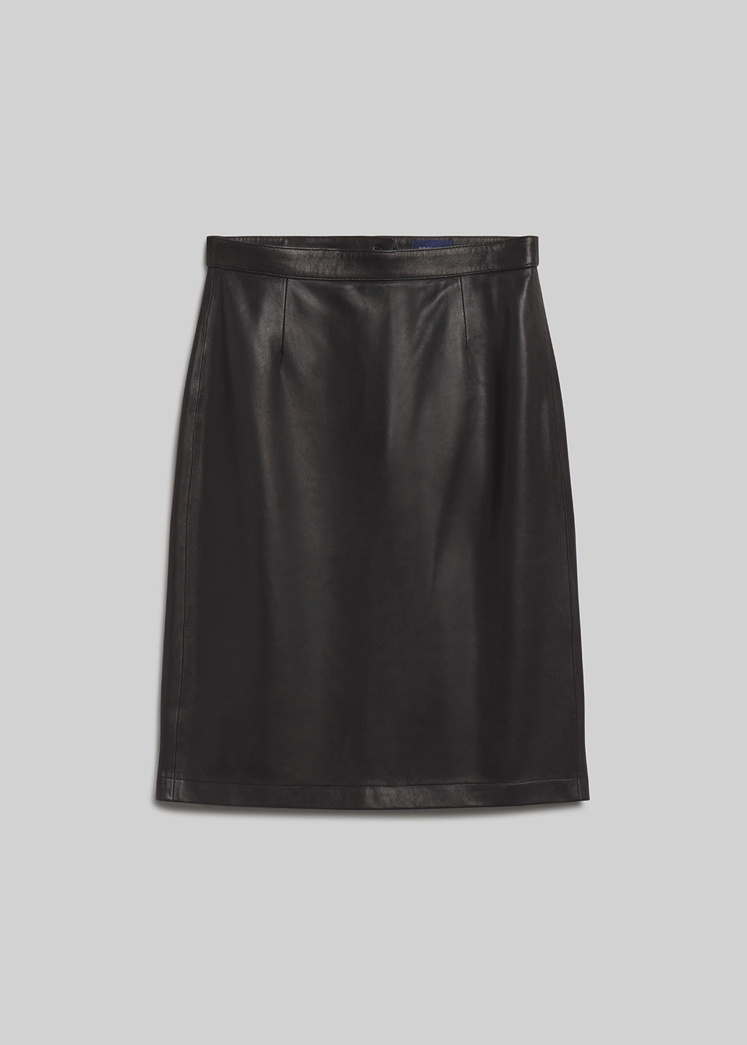 Black leather pencil skirt on grey background