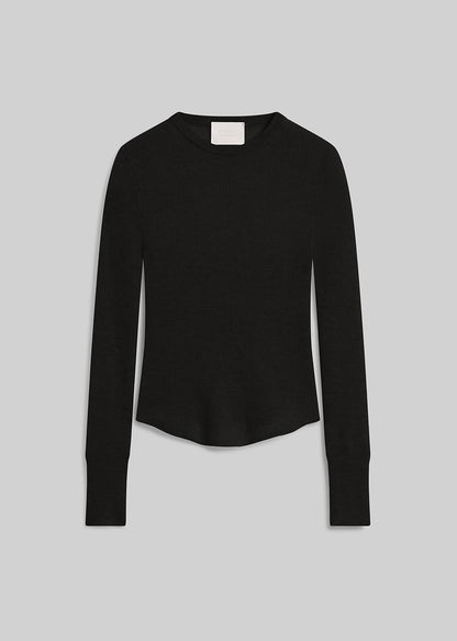 Black ribbed long sleeve crewneck sweater on grey background