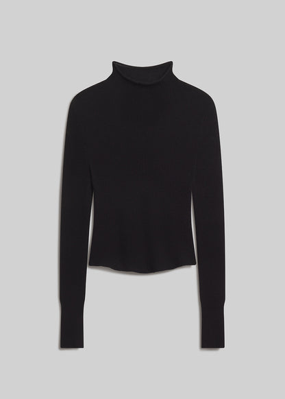 Black long sleeve turtleneck sweater on grey background
