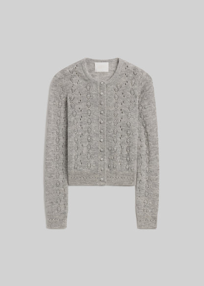 Heather grey pointelle knit button-front cardigan on grey background