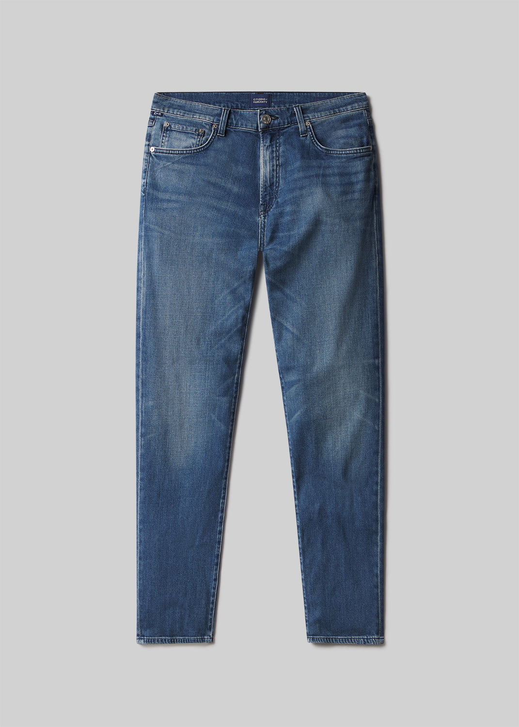 London Tapered Slim Tropical Denim
In Milestone