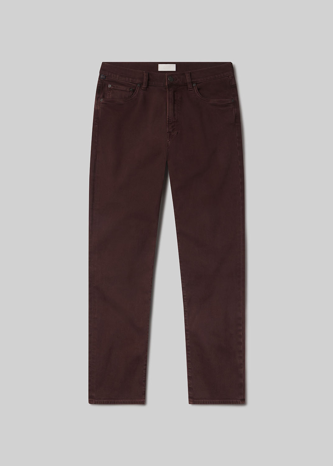 Burgundy pants on grey background