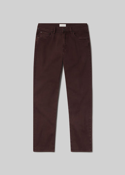 Burgundy pants on grey background