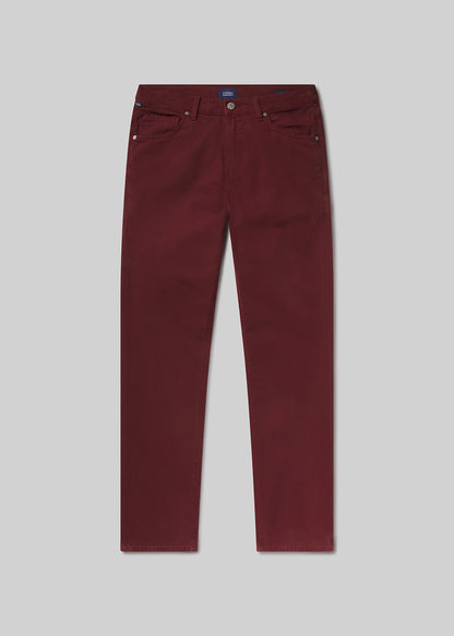Flat shot of maroon pants on a grey background