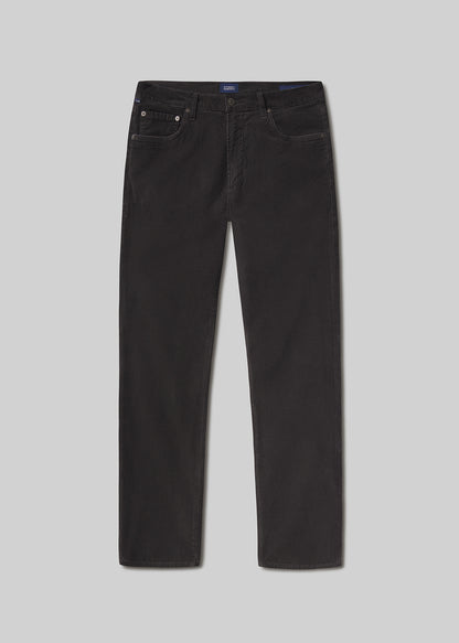 Flat lay shot of black jeans on a grey background