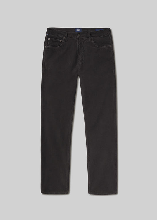Flat lay shot of black jeans on a grey background