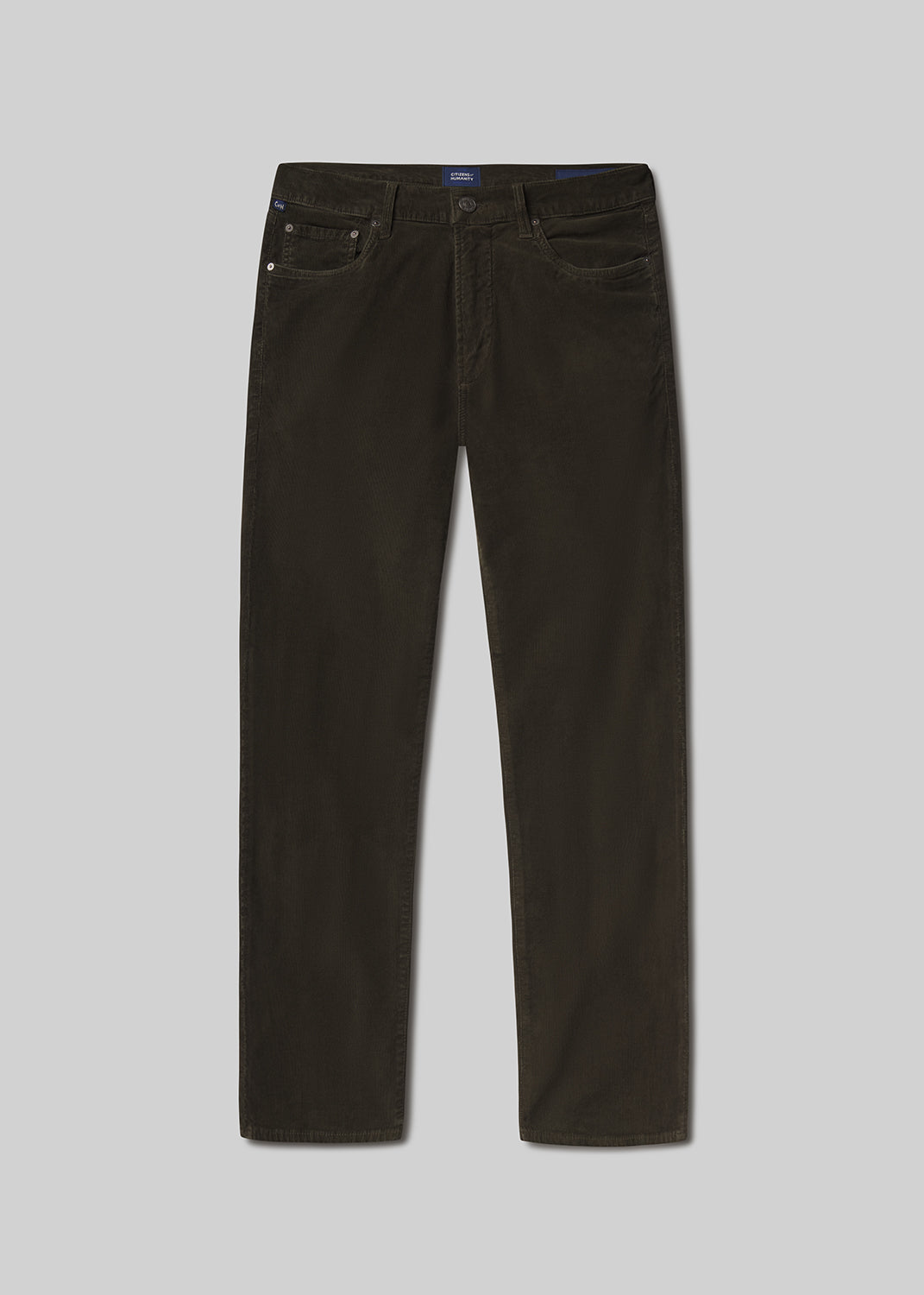 Flat lay shot of dark green jeans on a grey background