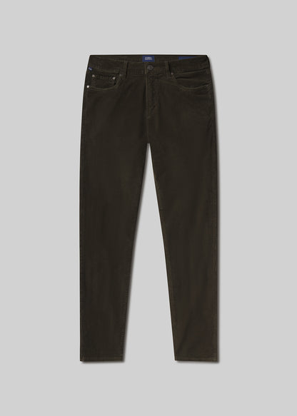 Flat lay shot of dark brown jeans on a grey background