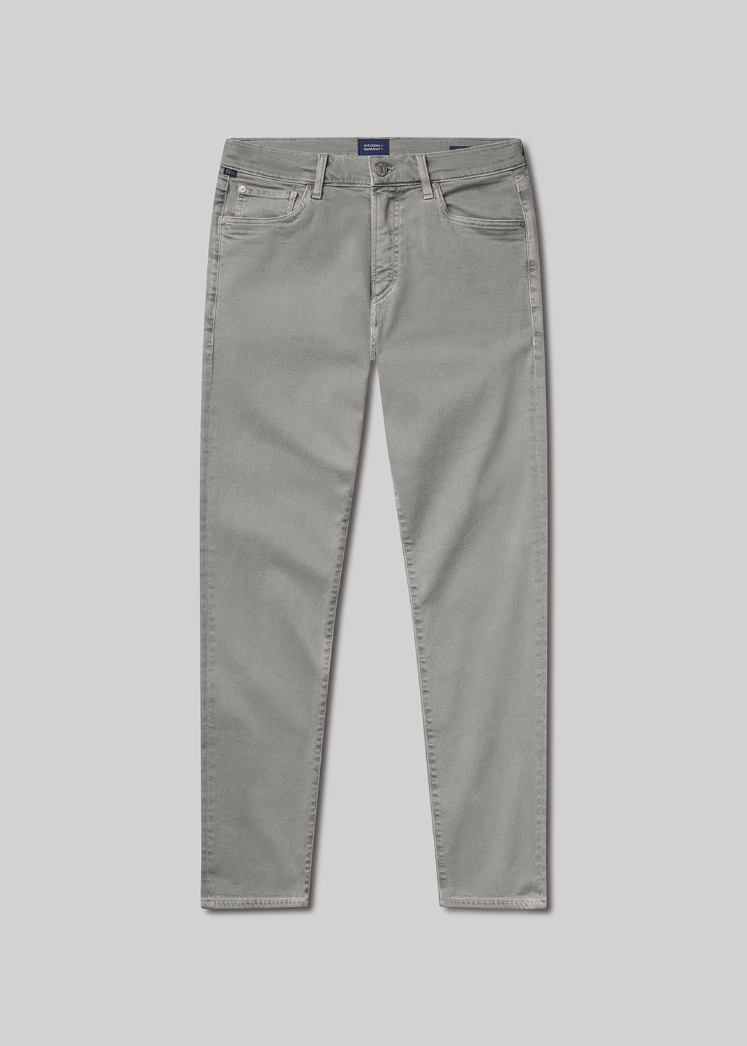 Flat shot of grey jeans on a grey background