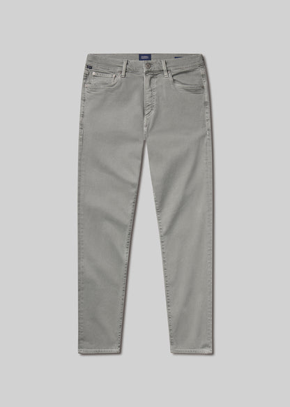 Flat shot of grey jeans on a grey background