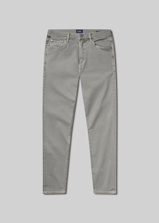 Flat shot of grey jeans on a grey background