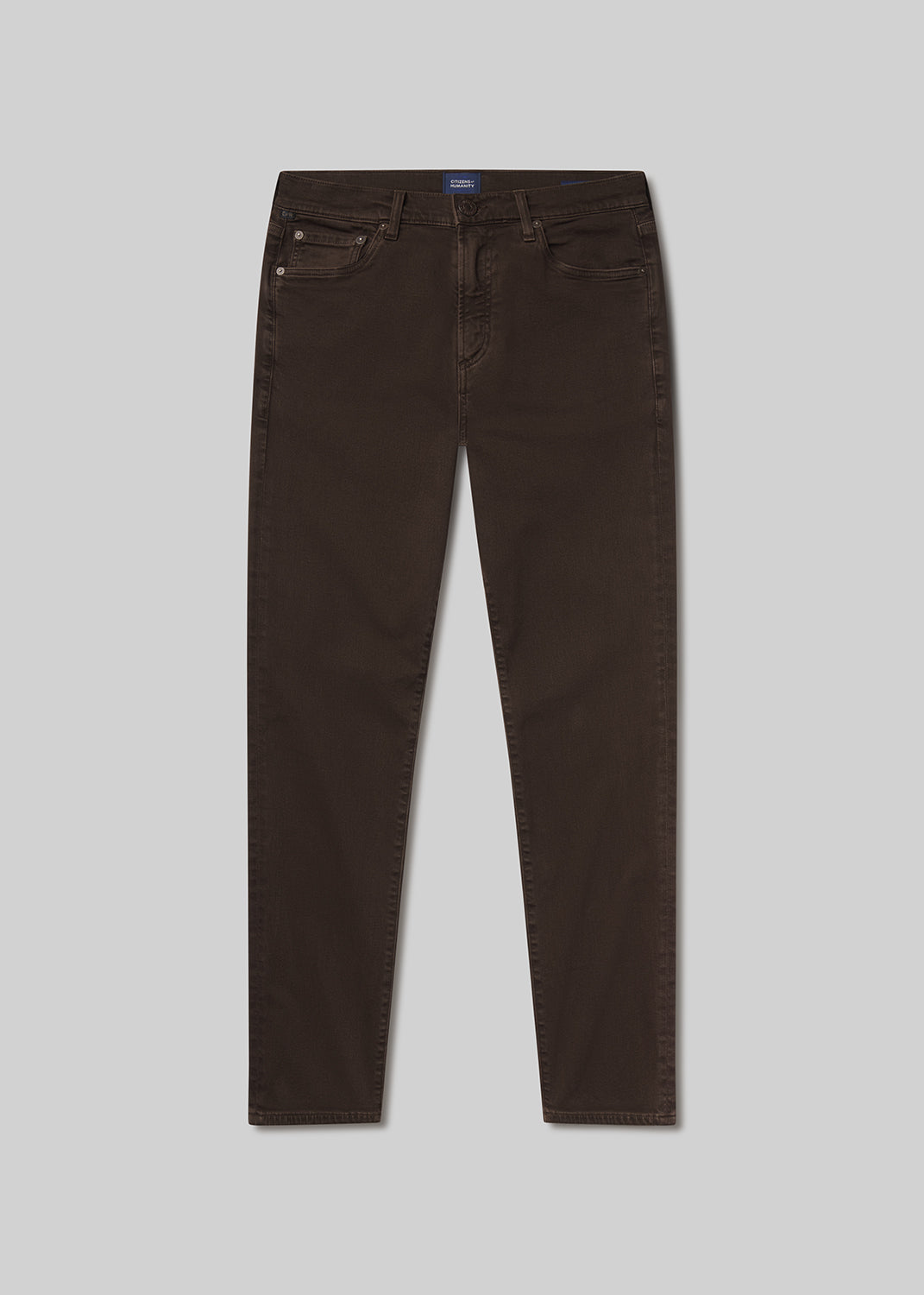 Brown jeans on a grey background