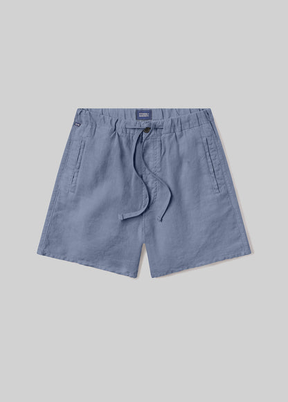 Stone blue drawstring shorts with an elastic waistband, adjustable drawstring, and side pockets, front flat lay view on a grey background.