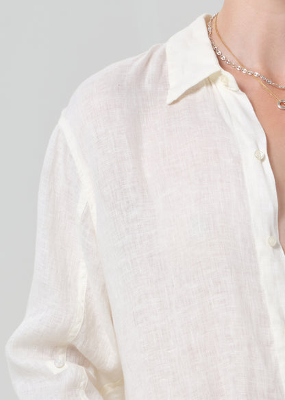 White button-up shirt with a plain background