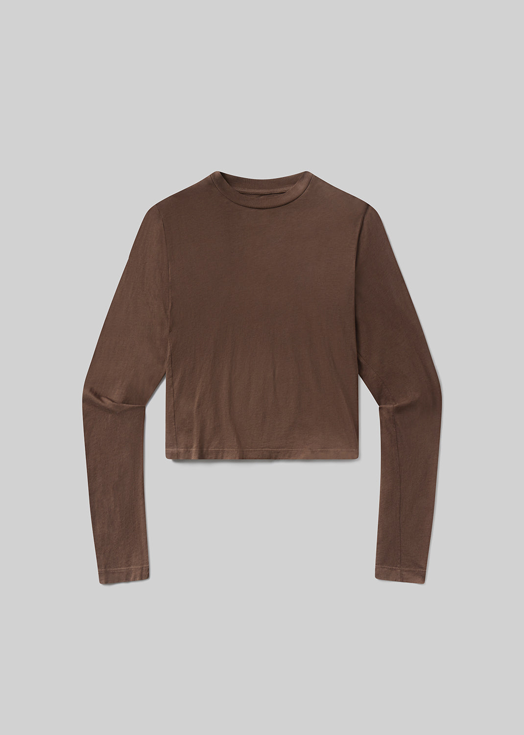 Brown long-sleeve top on a light gray background