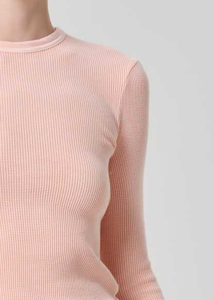 Person wearing a pink top