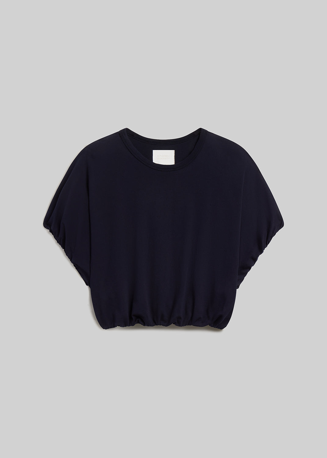 Navy short-sleeve bubble tee on grey background