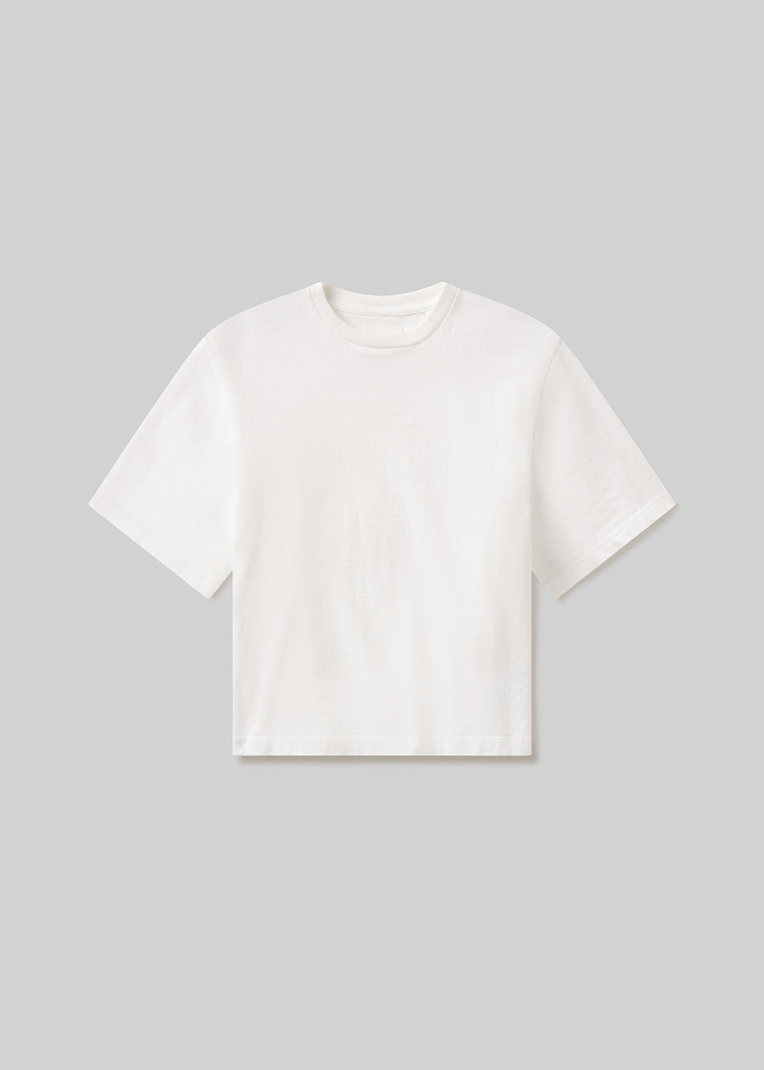 White t-shirt on a gray background
