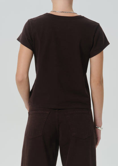 A person shown from the back wearing a dark brown short-sleeve crewneck t-shirt and matching dark brown pants, against a grey background.