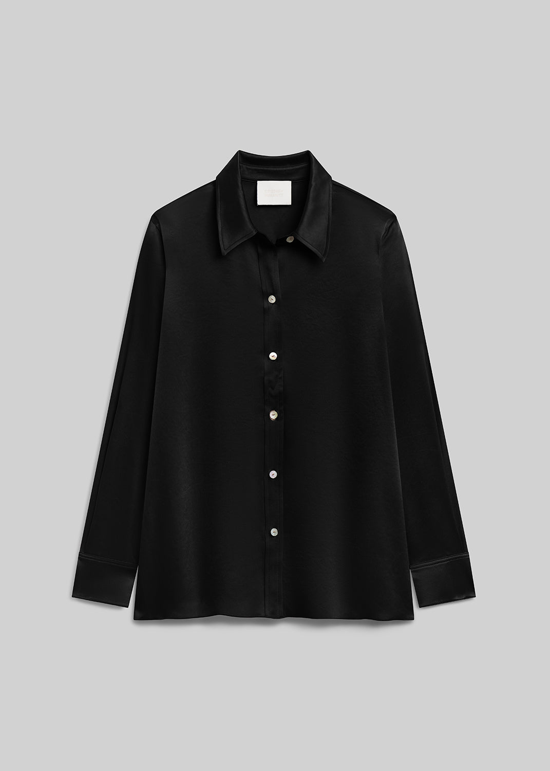 Black satin long sleeve button-down shirt on grey background