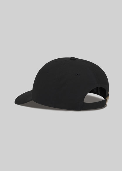 Black cap on a grey background