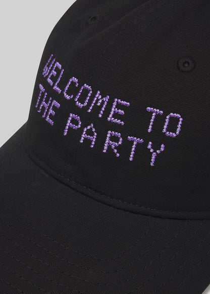 Black cap with 'WELCOME TO THE PARTY' text in purple on a gray background