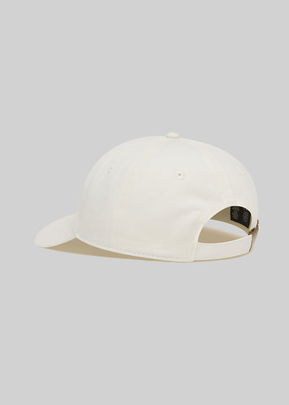 Cream cap on a light gray background
