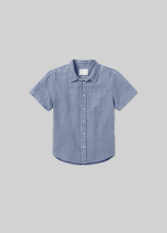 Stone blue short sleeve button-up shirt with a pointed collar, front button closure, and single chest pocket, front flat lay view on a grey background.