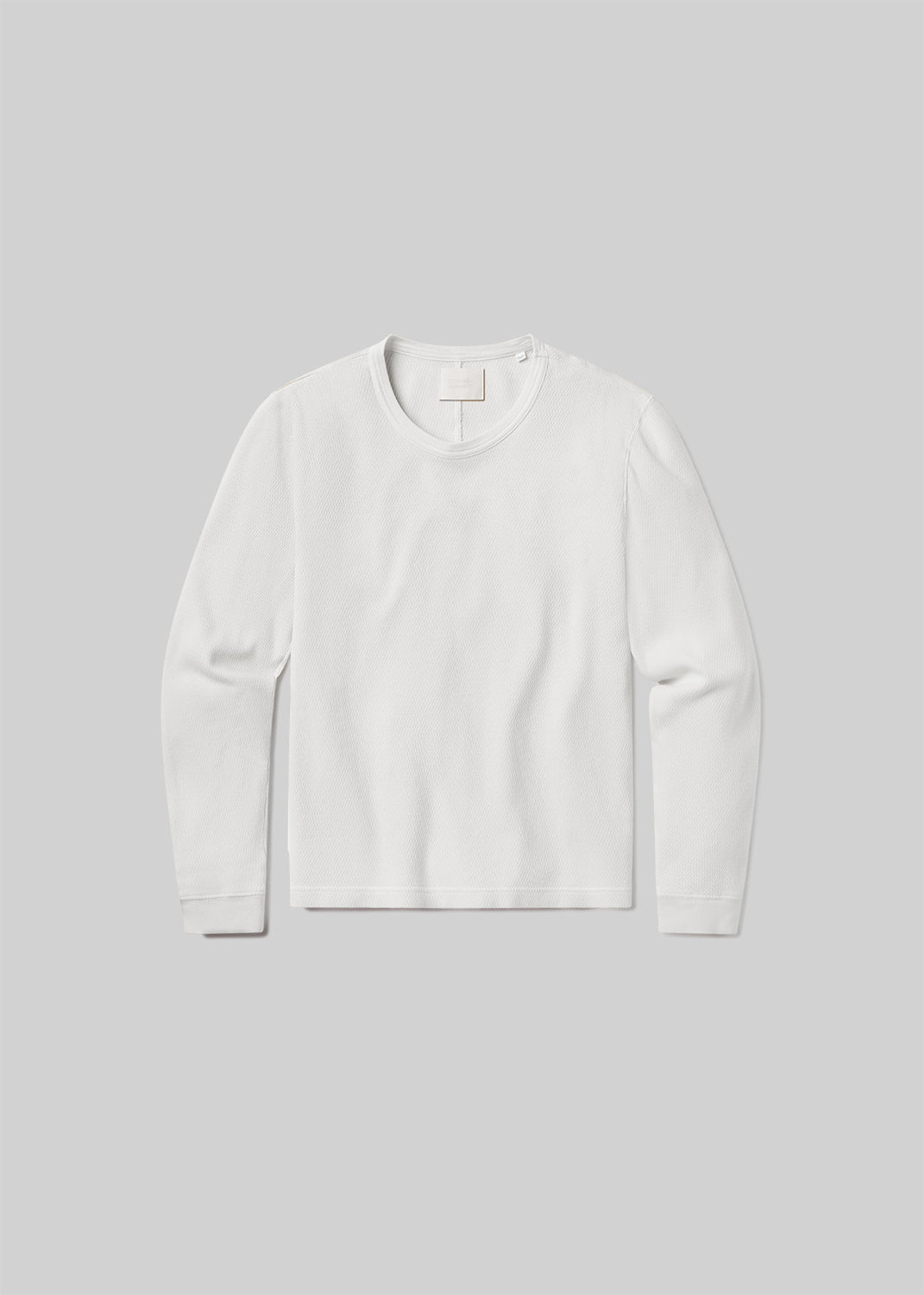 White waffle-knit long sleeve crewneck shirt, front product view