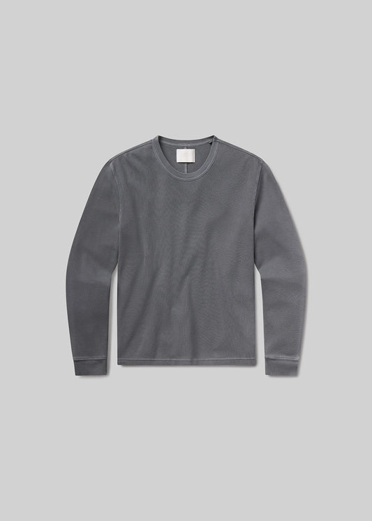 Flat of grey long-sleeve shirt on a grey background