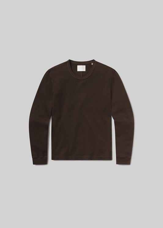 Flat shot of brown long-sleeve shirt on a grey background