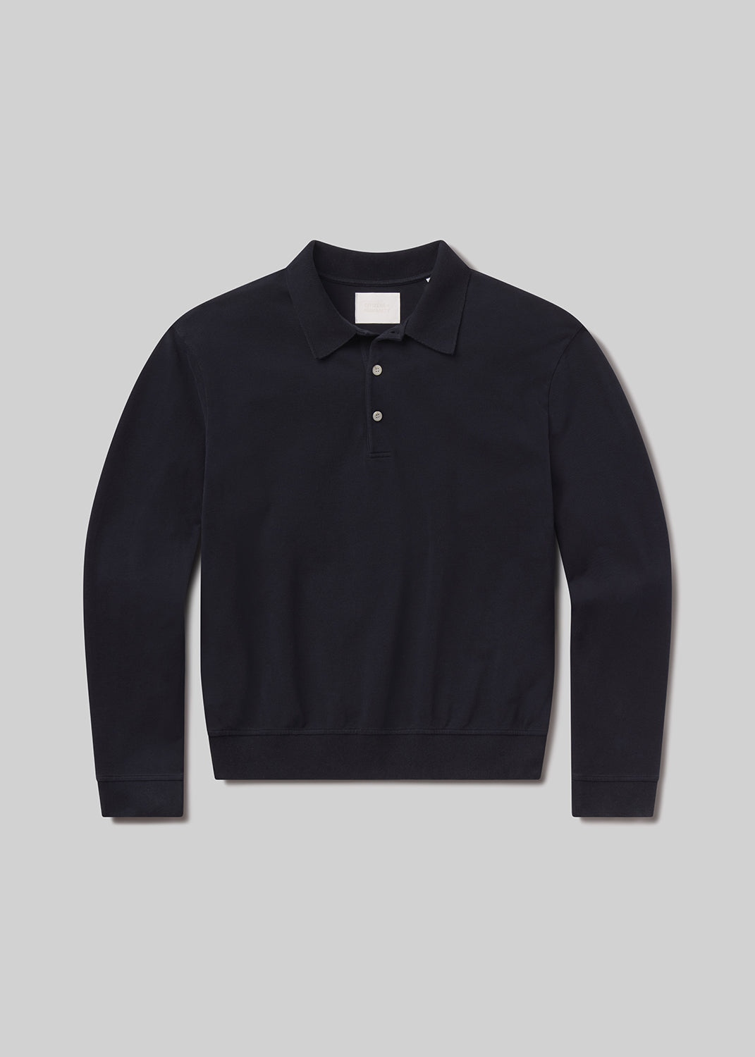 Black long-sleeve polo shirt on a grey background