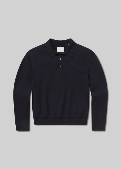Black long-sleeve polo shirt on a grey background